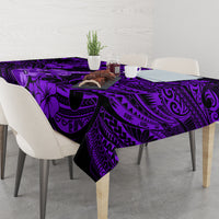 Purple Polynesian pattern tablecloth with black swirls on rectangular dining table