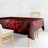 Red and black Polynesian-pattern tablecloth with ukulele design on dining table