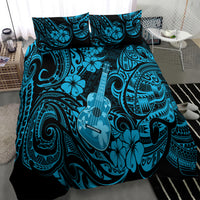 Polynesian ukulele bedding set with blue comforter and matching patterned pillowcases