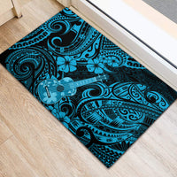 Rectangular rubber doormat in sky blue with black Polynesian motifs and ukulele graphic