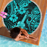 Turquoise round beach blanket, fringed edge, Polynesian ukulele and hibiscus pattern