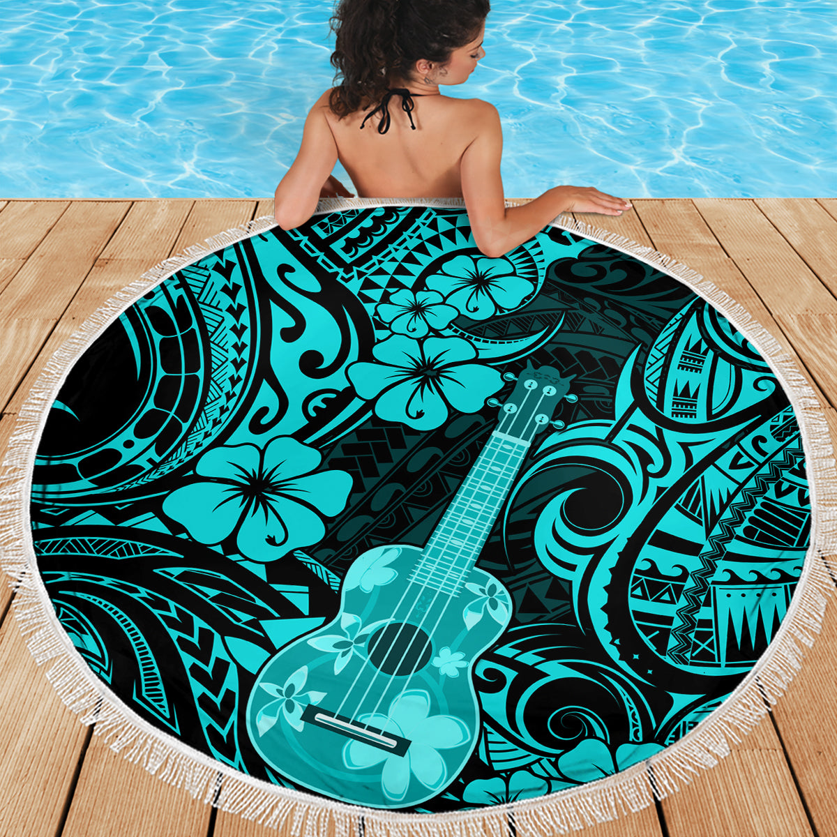 Turquoise round beach blanket with tassel fringe, Polynesian ukulele and floral design