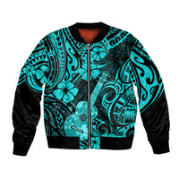 Unisex turquoise bomber jacket with Polynesian print, black sleeves, zip front.