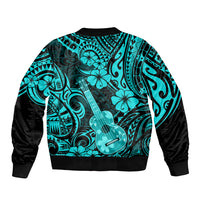 Unisex turquoise bomber jacket with Polynesian guitar and floral pattern, black sleeves.
