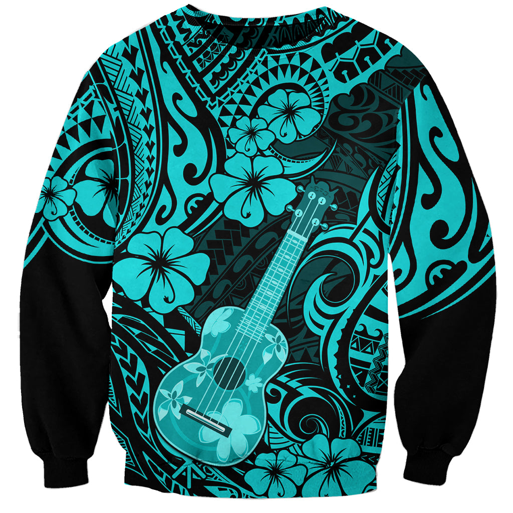 Turquoise crewneck sweatshirt with black sleeves, hibiscus & ukulele print