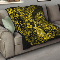 Yellow and black polynesian quilt blanket laid on sofa with ukulele and floral swirl motifs