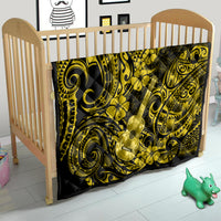 Yellow and black polynesian quilt blanket with ukulele graphic and floral scroll pattern