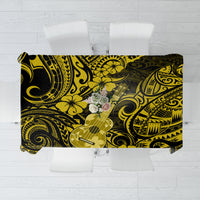 Yellow and black patterned tablecloth with floral and swirled motifs, rectangular drape