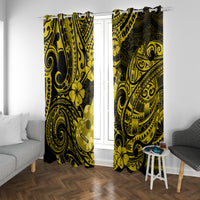 Yellow and black Polynesian pattern curtain panels, two long panels on a bright window.