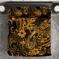 Gold and black Polynesian-pattern bedding set with matching pillowcases
