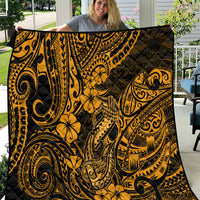 Gold-and-black Polynesian fish hook quilt with swirling floral patterns, laid out