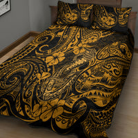 Gold and black quilt bed set with Polynesian fish-hook pattern, spread and pillow shams