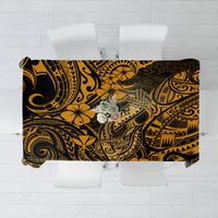 Rectangular tablecloth with black base and ornate gold Polynesian-style swirls and motifs.