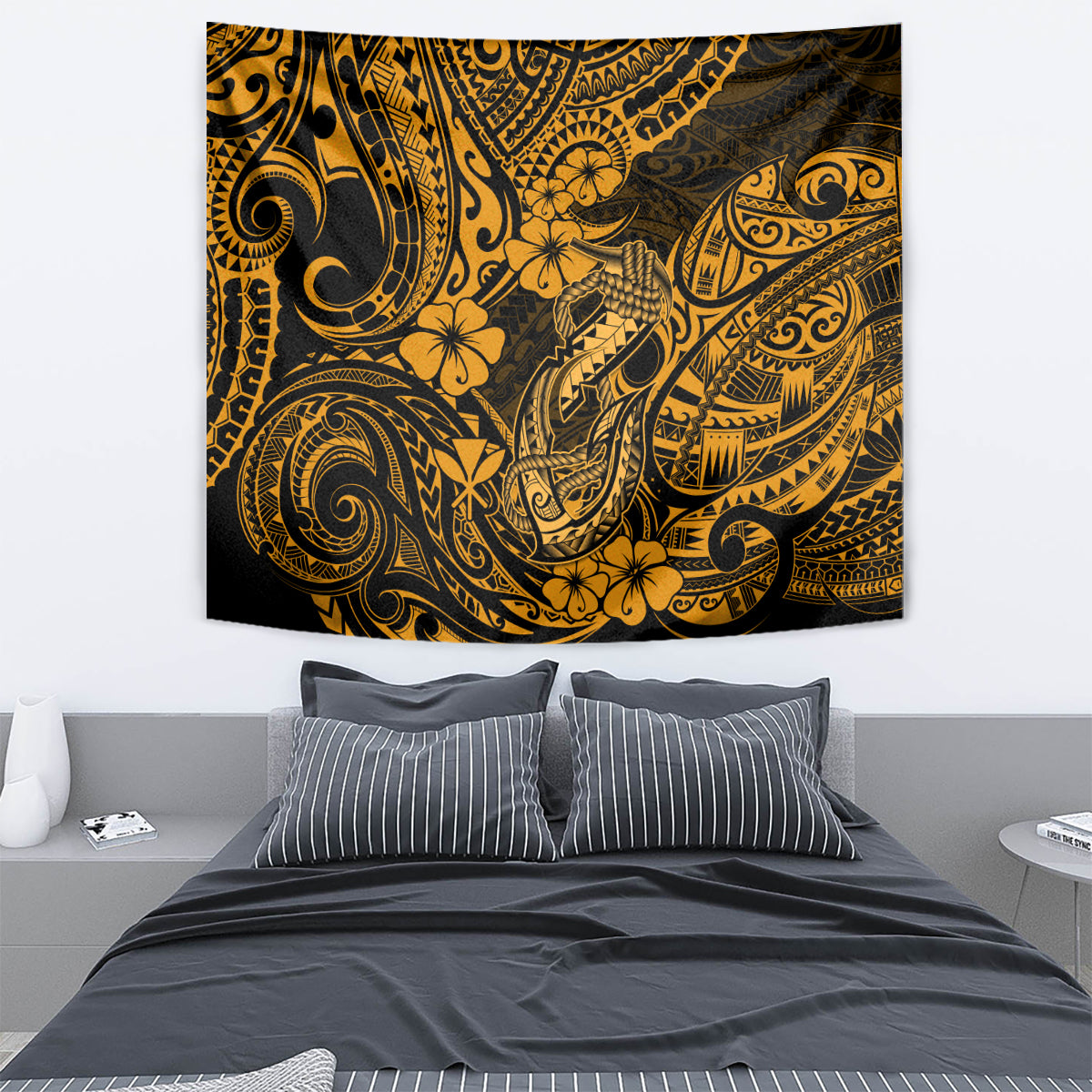 Gold and black Polynesian fish hook wall tapestry with intricate ornamental swirl pattern