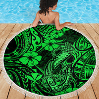 Round green Polynesian beach blanket with white fringe edge