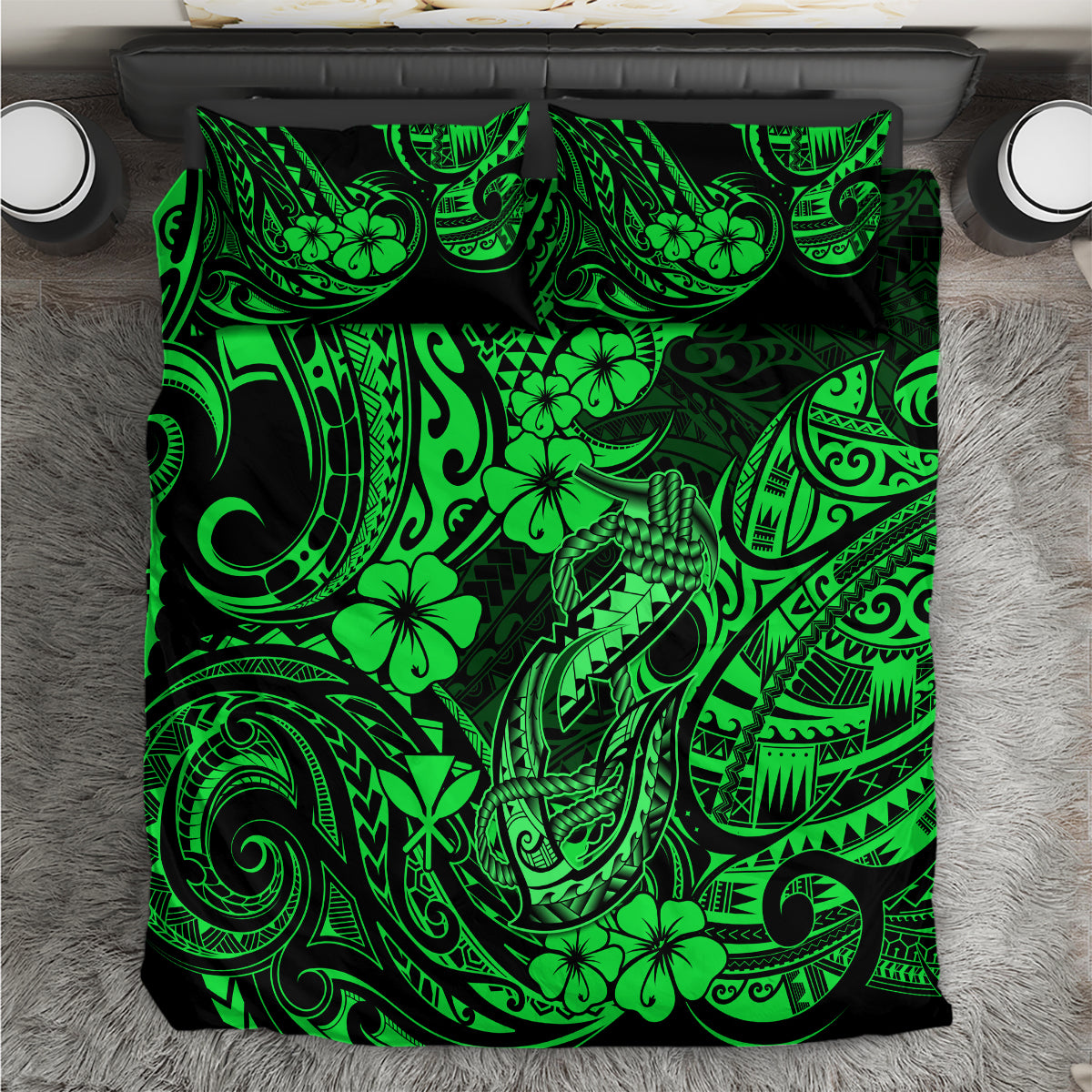 Green Polynesian fish hook pattern comforter with bold black and neon motif
