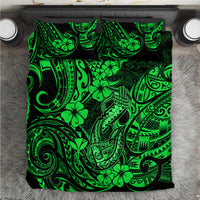 Green Polynesian fish hook pattern comforter with bold black and neon motif
