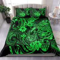 Green Polynesian fish hook pattern bedding set with matching pillowcases and comforter