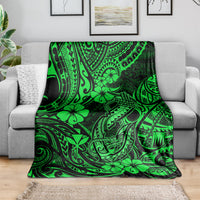 Green Polynesian fish hook blanket with black and bright green floral and tribal print