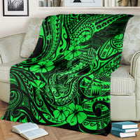 Green Polynesian fish hook blanket with bold tribal swirls, floral motifs, and fish hook