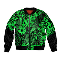Green bomber jacket with Polynesian fish-hook pattern, front zip, black sleeves