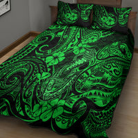 Green and black quilt bed set featuring Polynesian swirls and clover-like flower motifs