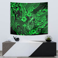 Green Polynesian fish hook tapestry with intricate tribal fish motifs and swirling designs