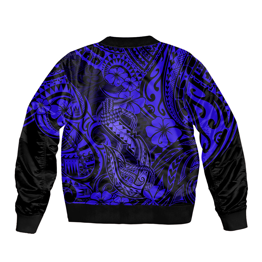 Bomber jacket with bold blue Polynesian fish hook print, ribbed hem and black sleeves