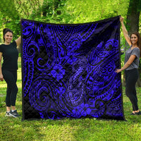 Navy fish-hook quilt blanket with Polynesian tribal swirls and floral motifs