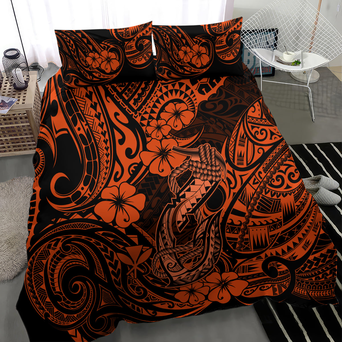 Orange and black Polynesian pattern duvet with two pillowcases, angled view
