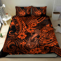 Orange and black Polynesian pattern bedding set with two pillowcases on bed