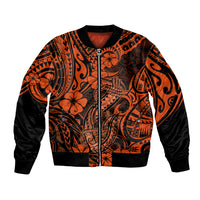 Orange bomber jacket with black sleeves, zip front, Polynesian fish hook pattern