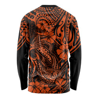 Orange long-sleeve shirt with black Polynesian fish hook pattern on back, crew neck