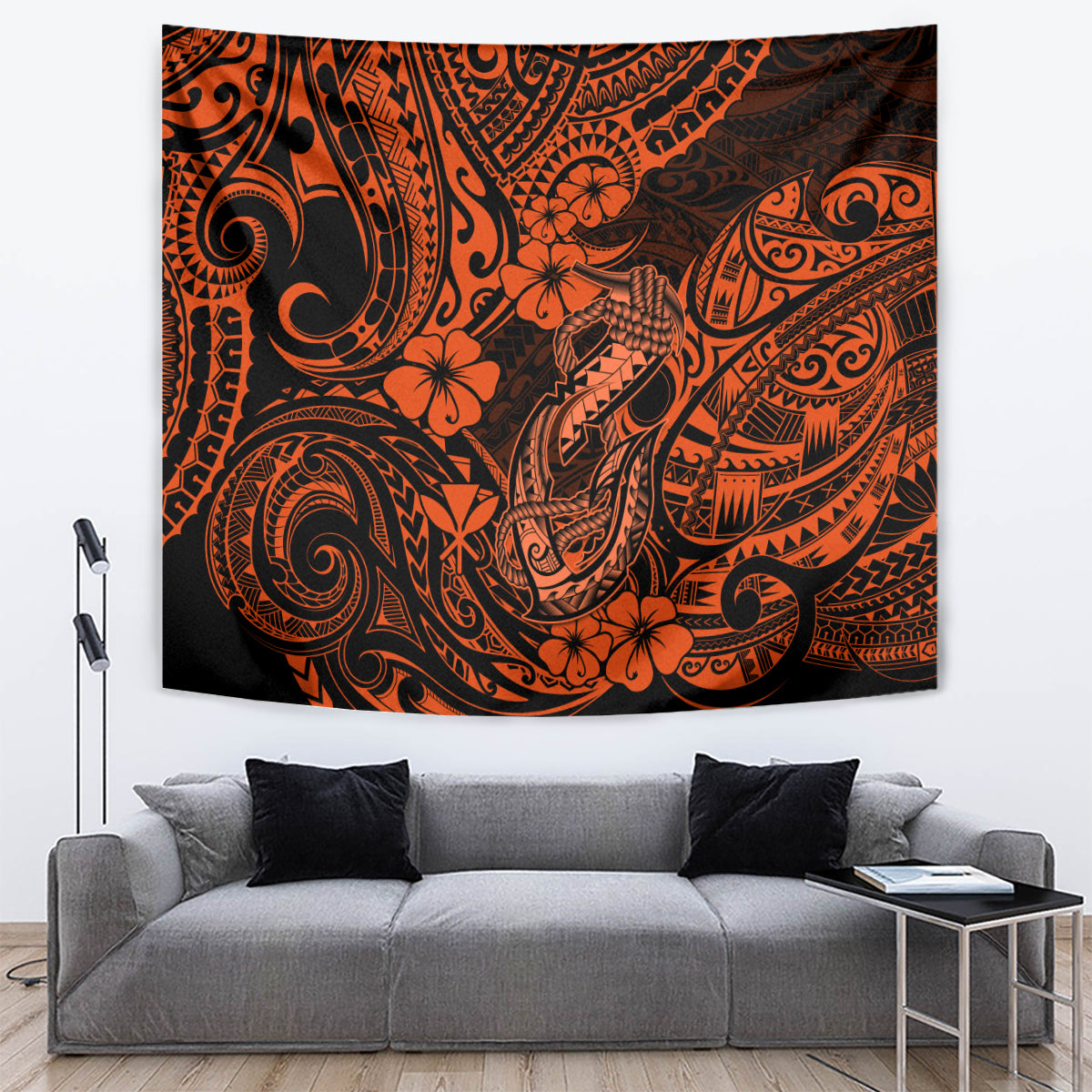 Orange and black Polynesian fish-hook tapestry with swirling motifs and flowers