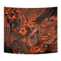 Orange and black Polynesian fish-hook tapestry shown full view with floral swirls