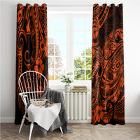 Orange and black Polynesian patterned drapes on a rod with bold swirl graphics