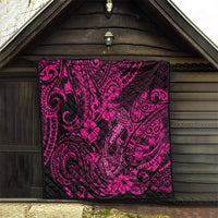 Pink and black Hawaii fish hook quilt hanging on wooden wall, hibiscus tribal pattern