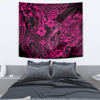 Rectangular wall tapestry in pink and black with swirling tribal pattern and hibiscus