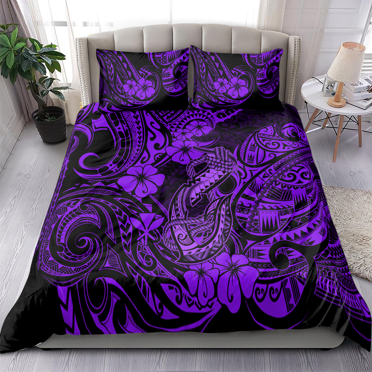 Purple Hawaiian bedding set with hibiscus and tribal tiki fish hook pattern, on bed
