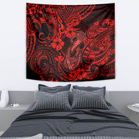 Red hibiscus and tribal fish hook tapestry wall hanging with intricate swirl motifs.