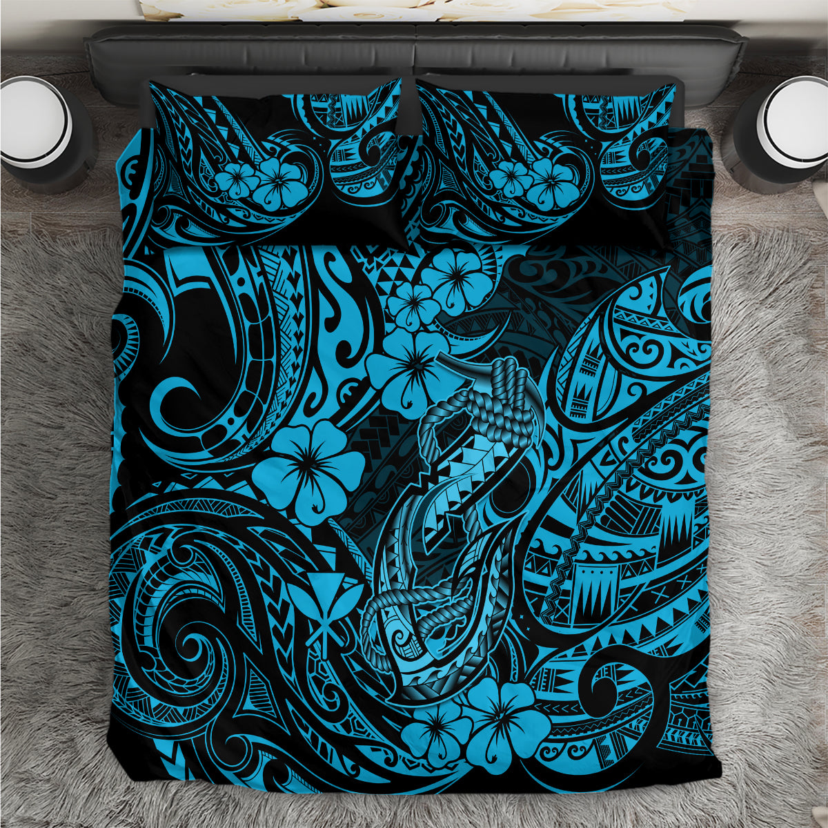 Blue tribal bedding cover with hibiscus flowers and fish hook motif pattern