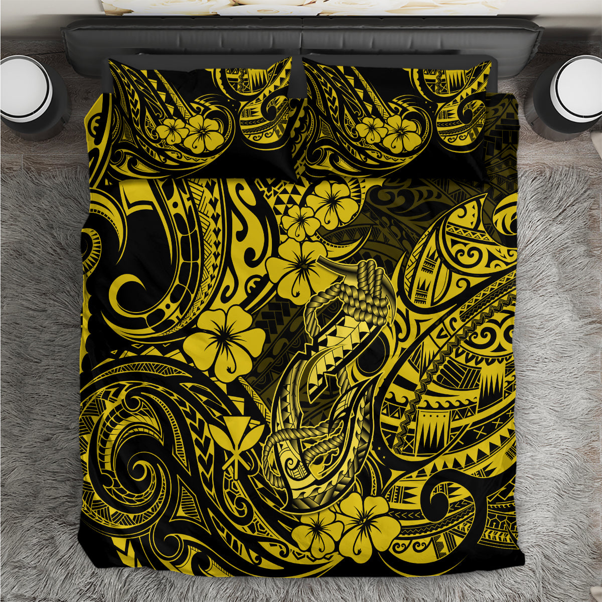Yellow and black tribal bedding set with hibiscus and fishhook motifs on duvet
