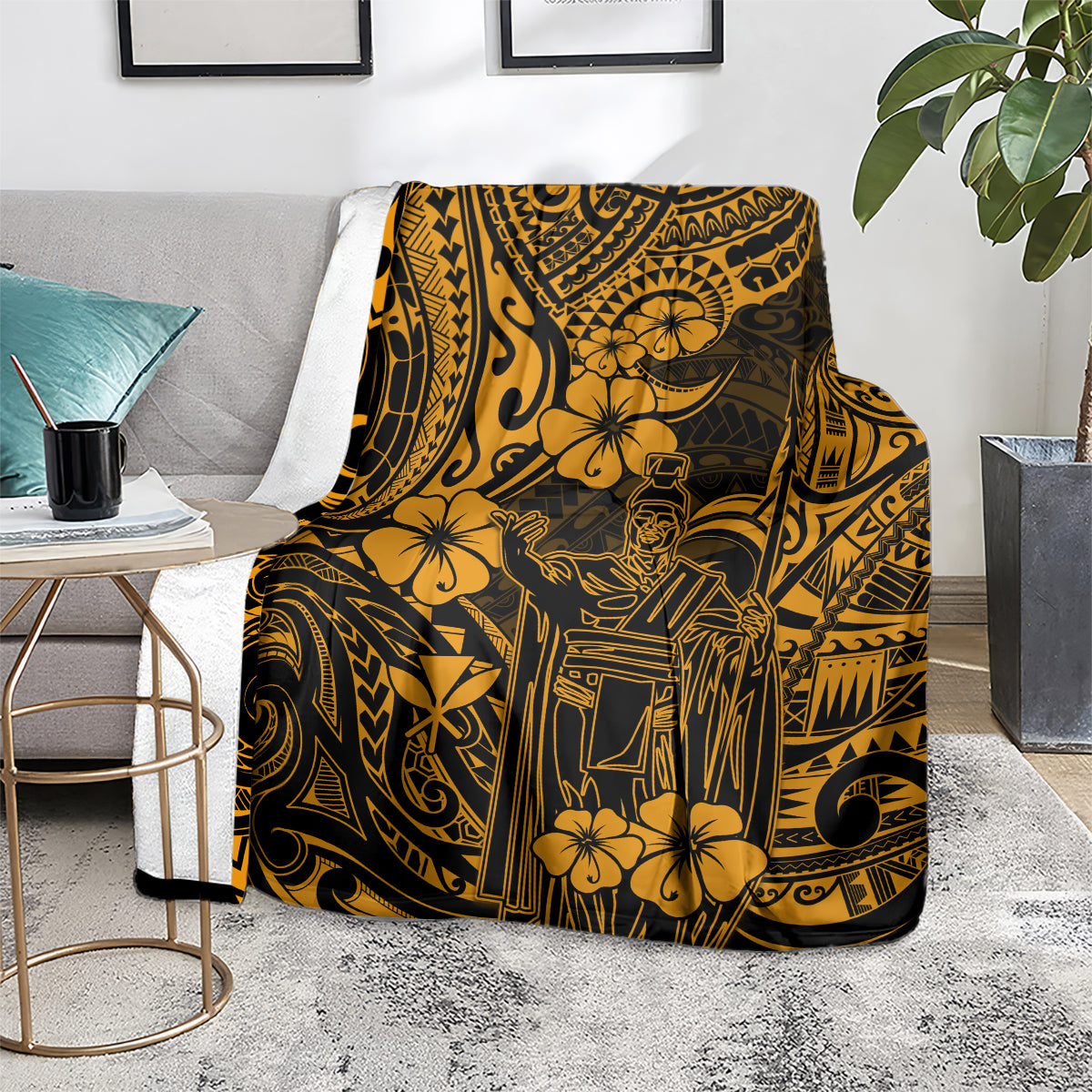 Gold and dark Polynesian pattern blanket over a couch seat, showing tribal symbols and flowers