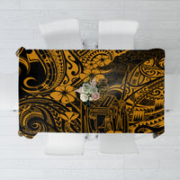Black and gold Polynesian patterned tablecloth with decorative center medallion design.