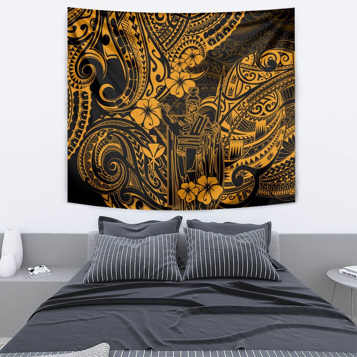 Gold and black patterned tapestry wall hanging with ornate swirls and figures