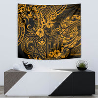 Gold and black Polynesian tapestry wall hanging with stylized face and flowers