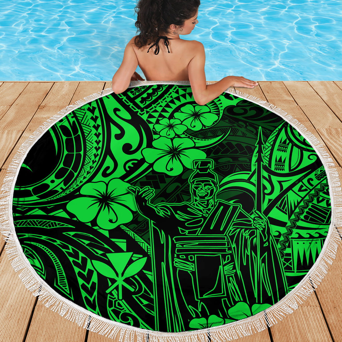 Green round Polynesian beach blanket with fringed edge and detailed graphic