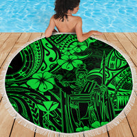 Green round Polynesian beach blanket with fringed edge and detailed graphic