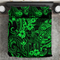 Green Polynesian patterned duvet and sheet set with black and neon green artwork