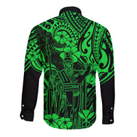 Long sleeve button shirt with green Polynesian pattern and black cuffs